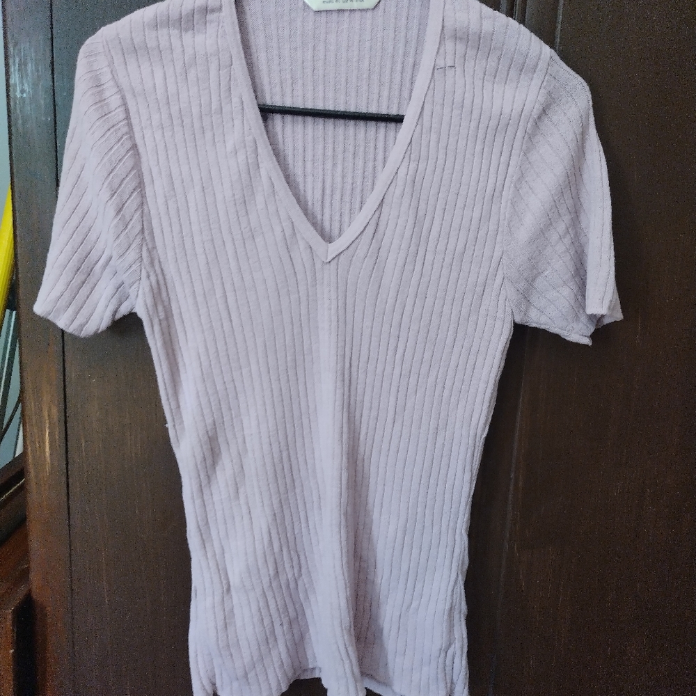 Pink v-neck shirts